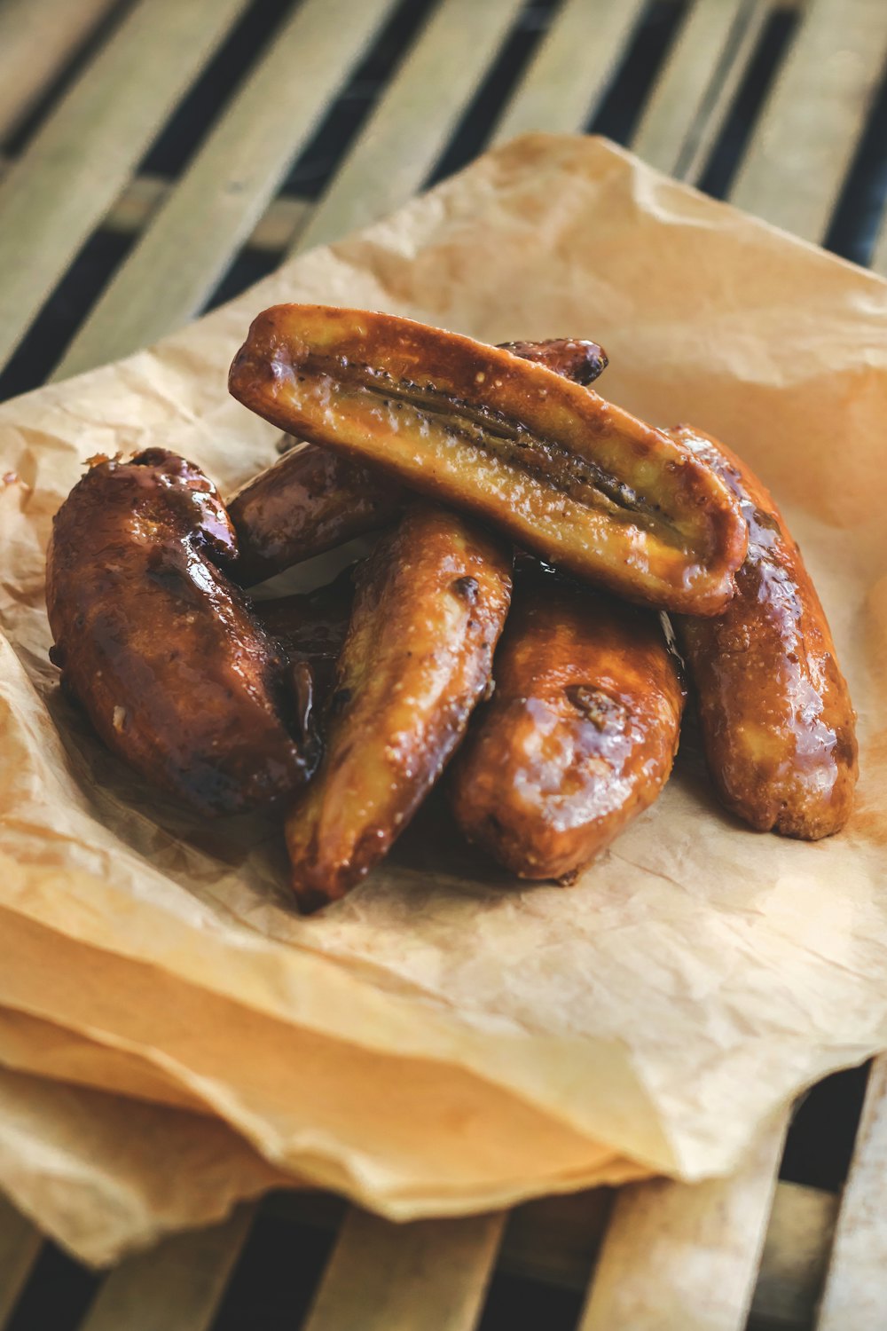 Stock photo of fried plantains and chicken on paper